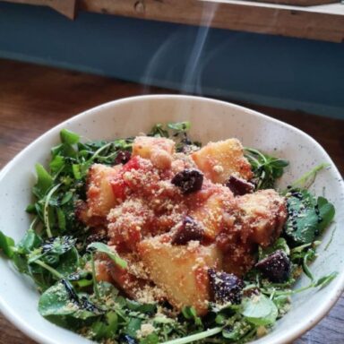Italian Black Olive and Potato Stew with Cashew Parmesan Garden Salad Gluten Free Essence Yoga Retreats